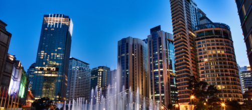 The city of Kuala Lumpur at night (Image via Jakub Michankow - Flickr)