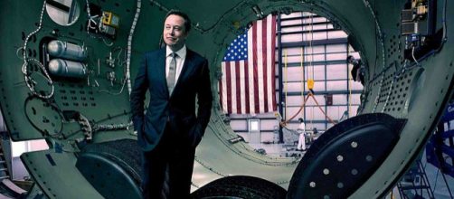 Elon Musk stands inside a rocket awaiting assembly (Image Credit: SpaceX/Wikimedia Commons)