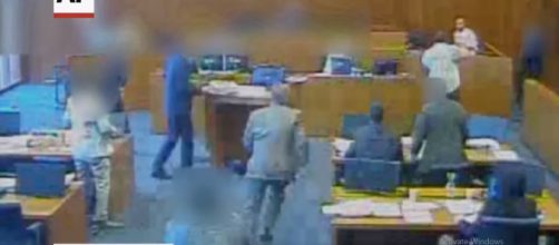 Angilua died shortly after being shot. [image source: youtube/Associated Press]