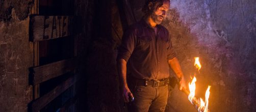 Rick queimando o taco de Negan, Lucille.