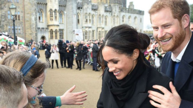 Prince Harry, Meghan Markle greeted by cheering fans in Wales ... - go.com