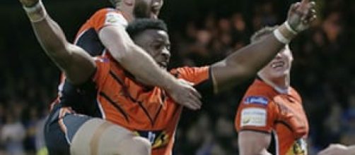 Gadwin Springer celebrates his magnificent try against Leeds in May 2016. Image Source - theguardian.com