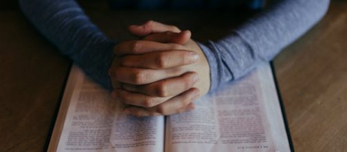 Is prayer actually benefical during hardships? [image source:TBN/YouTube screenshot]