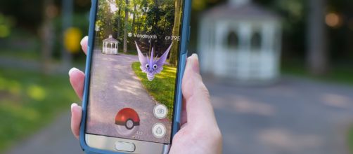 Person playing 'Pokemon GO' -- Penn State/Flickr