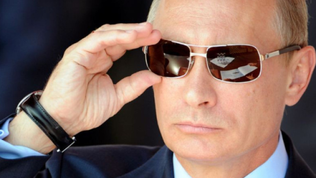In alto, il presidente russo Vladimir Putin