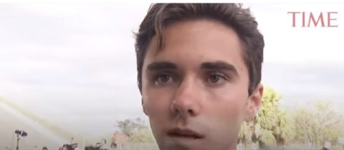 A shooting survivor protests for stricter gun laws. [Time / YouTube screencap]