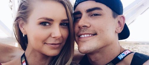 Ariana Madix and Tom Sandoval take a selfie at a NASCAR race. [Photo via Instagram]