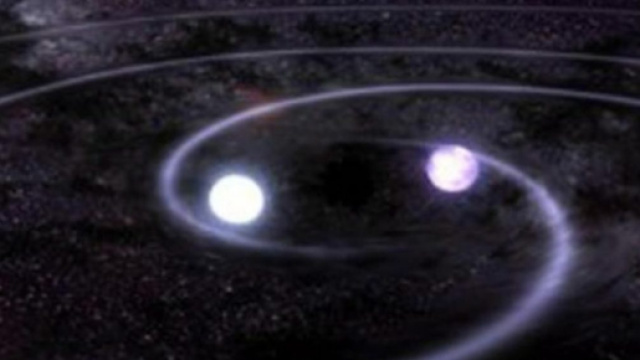 In alto, un sistema binario di stelle a neutroni