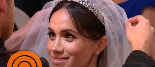 Prince Harry lifts Meghan Markle's veil. - [Image: Today/YouTube screenshot]