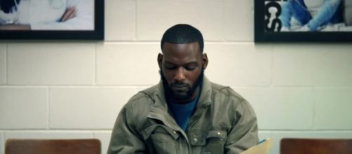 'Ralph Angel' reads the paternity test results (Image credit - OWN/YouTube)