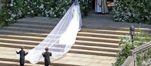 Meghan Markle's wedding gown and the significance behind it. - [Image Credit: Nora Williams / YouTube Screenshot]