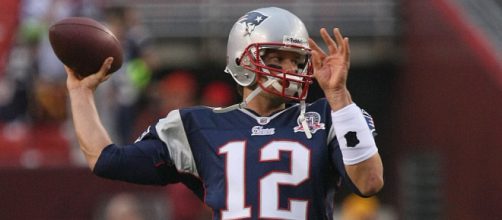 Tom Brady warms up. By Keith Allison/Flickr