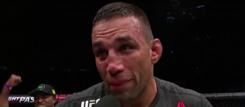 Fabricio Werdum talks inside the Octagon following his win at UFC Fight Night 121. [image source: UFC - Ultimate Fighting Championship/YouTube]