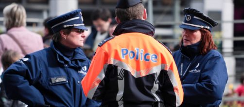 A meeting of Belgian police officers (Image via Matthew Kenwrick - Flickr)