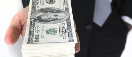 Money is magic. - [Image via Flickr / Creative Commons]