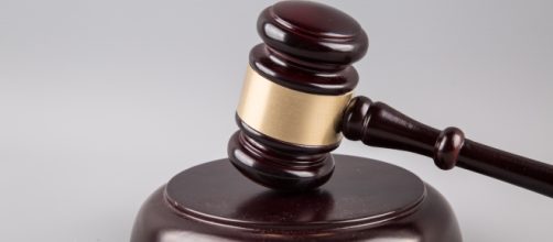 These two accused murderers are soon to go to trial. [Image source: George Hodan - Public Domain Pictures]