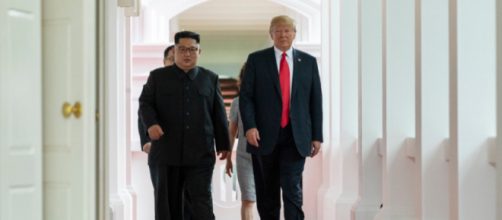 Kim and Trump walking to the summit room during the Singapore Summit. - [Dan Scavino Jr / Wikimedia Commons]