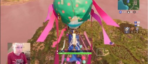 Orange Shirt Kid ignoring the hate. [Image source: OrangeShirtKid/YouTube]