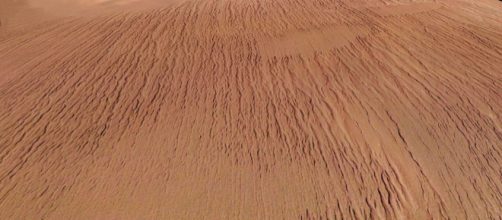 &lsquo;Yardangs&rsquo; sculpted by wind-blown sand on Mars (Image courtesy - ESA/DLR/FU Berlin (G. Neukum), Wikimedia Commons)