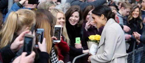 Meghan Markle interacting with women during her visit to Belfast. [Image credit &ndash; Northern Ireland Office, Wikimedia Commons]