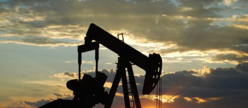 Big oil seeks government bailout to protect itself from climate change Photo Credit: Paul Lowry/Flickr