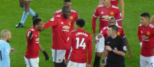 Manchester United face backlash by fans for under performing this season. [Image via: Ardfern/ Wikimedia Commons]