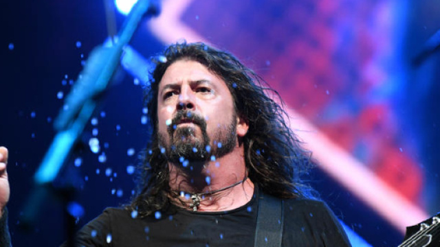 Dave Grohl Chugs Beer, Immediately Falls Off Stage | 104.1 Jack FM - radio.com