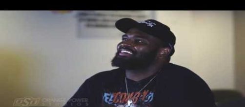 Darrion Daniels is mighty impressed by Nebraska football's strength program. [Image via Oklahoma State Athletics/YouTube]