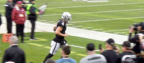 Derek Carr threw three touchdown passes on Sunday. [Image Source: Flickr | Jim Goff]