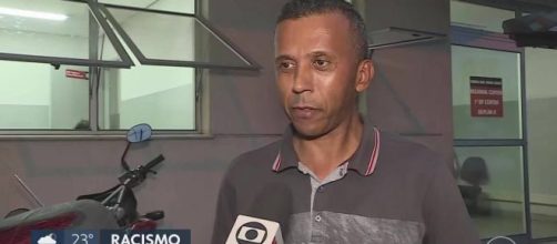 Mulher &eacute; detida por inj&uacute;ria racial contra taxista em BH. (Reprodu&ccedil;&atilde;o/TV Globo)