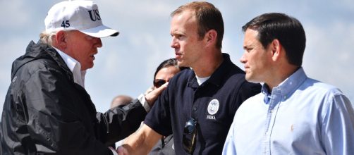 President Donald Trump, left, greets Brock Long, center, and Sen. Marco Rubio in Fort Meyers, Fla. - Image credit -U.S. Department of Defense