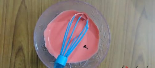 Red colored chocolate ganache. - [Love4cake - YouTube screencap]