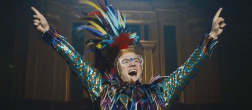 Taron Egerton plays Elton John in the biopic "Rocketman." [Image We Got This Covered/YouTube]