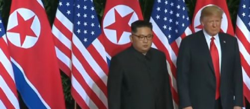President Trump, Kim Jong Un meet in Singapore. [Image source/CNN YouTube video]