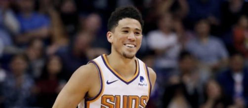 The Suns' Devin Booker dropped 37 points in a win over the Golden State Warriors on Sunday. [Image via NBA/YouTube screenshot]