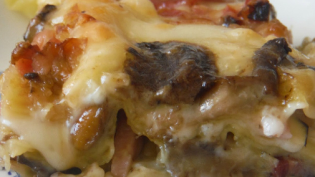 Ricetta Lasagna speck e funghi.