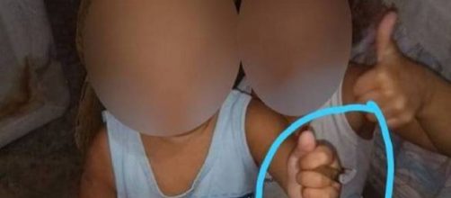 Crian&ccedil;as com cigarro de maconha em m&atilde;os. (Reprodu&ccedil;&atilde;o)