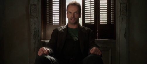 Sherlock wakes up Watson. - [CBS / YouTube Screencap]