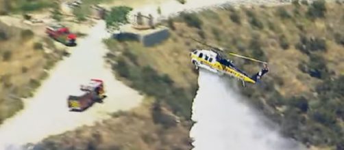 Los Angeles-area amusement park evacuated due to fire. [Image source/ABC News YouTube video]