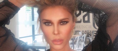 Brandi Glanville poses during a photo shoot. [Image credit Brandi Glanville / Instagram]