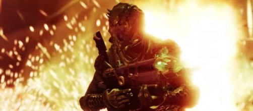 A guardian holding the Bad Juju Exotic Pulse Rifle. [Image source: destinygame/YouTube]