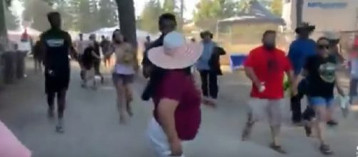 Crowd runs after hearing gunshots at California Garlic Festival. [Image source/NBC News YouTube video]