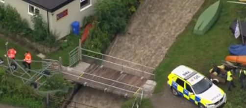 Town evacuated as dam wall collapses. [Image source/BBC News YouTube video]