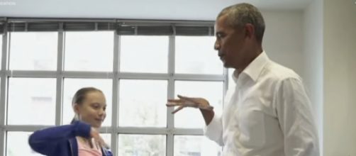 Former President Obama meets climate activist Greta Thunberg. [Image source/VOA news YouTube video]