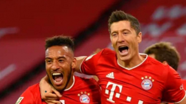 Nella foto Tolisso e Lewandowski.