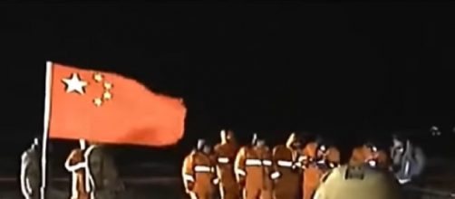 Chang'e 5 capsule of China returns to Earth carrying Moon samples. [Image source/CNA YouTube video]