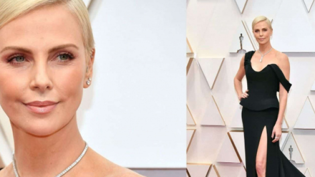 Charlize Theron abito nero lungo per gli Oscar 2020.