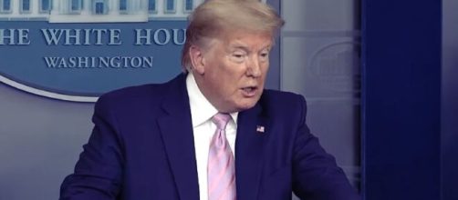 Covid-19: Trump says be ready for tough two week ahead, 'going to be a lot of death' in US. [Image Source: Guradian News/ YouTube Screenshot]