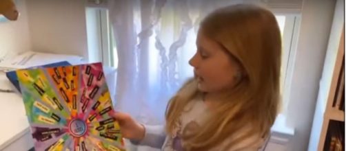 Stella shows "CBS This Morning" her "empower poster" as part of a look at the pandemic through children's eyes.[Image source:CBS-YouTube]