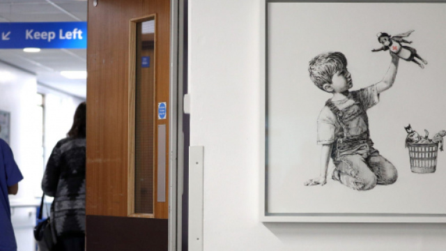 A new Banksy artwork of a superhero nurse appeared in a UK ... - com.au